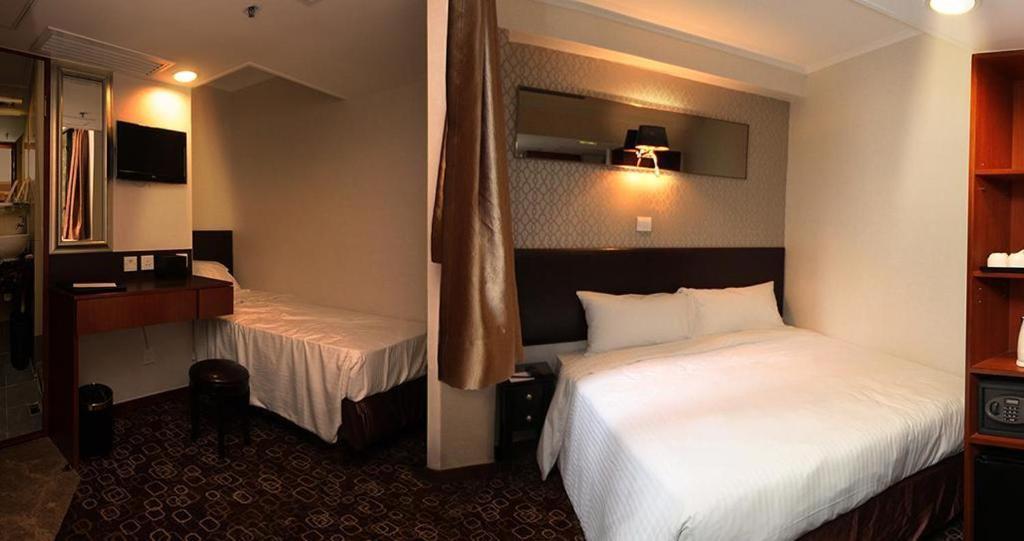 แลนเดอร์ โฮเต็ล ปริ๊นซ์ เอดเวิร์ด Hotel ฮ่องกง ห้อง รูปภาพ
